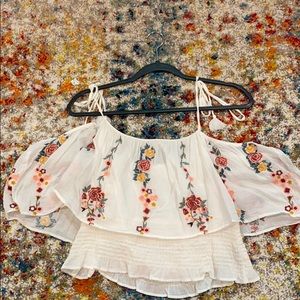 Dainty off the shoulder crop